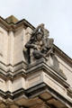 Pre-historic Period sculpture on facade of National Museum of Wales, attrib. Gilbert Bayes,. Cardiff, Wales.