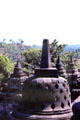 Lawu Volcano in distance on the island of Java seen against Borobudur stupas. Indonesia.