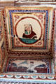 Murals on turn-of-the-century haveli shows Indian listening to Gramophone. Mandawa, India.