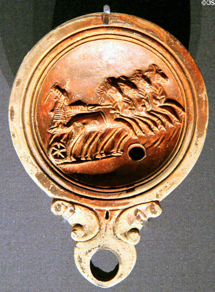 Roman oil lamp with charioteer (1st-2ndC) at Kunsthistorisches Museum. Vienna, Austria.