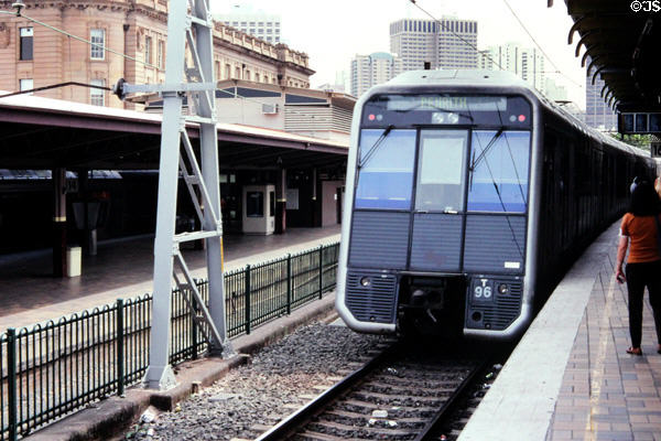 Sydney commuter train pulling up to station. Sydney, Australia.