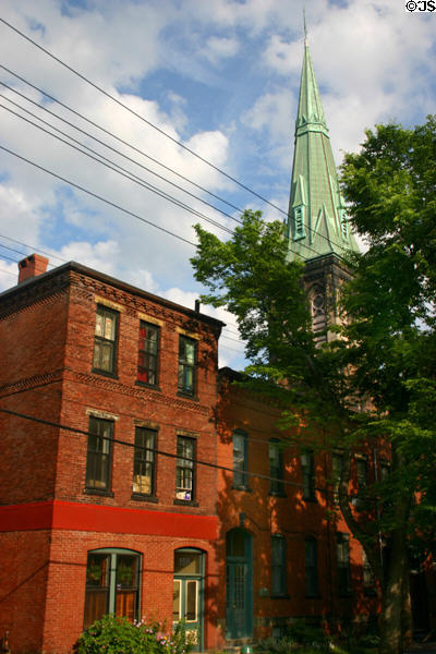Row house on Germaine St. with steeple of St. Andrews & St. David. Saint John, NB.