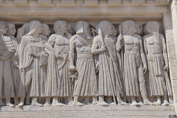 Carving of parade of ancient cultures represented at Royal Ontario Museum. Toronto, ON.