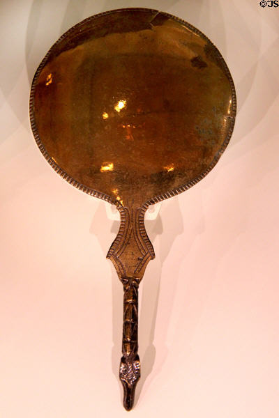 Etruscan bronze mirror reflecting surface (c300-200 BCE) at Royal Ontario Museum. Toronto, ON.