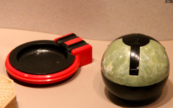 Plastic ashtray (1934) from HMS Queen Mary & closed ashtray (1930s) from England at Royal Ontario Museum. Toronto, ON.