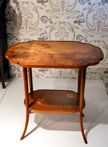 Art Nouveau pedestal table with country scene marquetry (c1900) by Émile Gallé at Montreal Museum of Fine Arts. Montreal, QC.