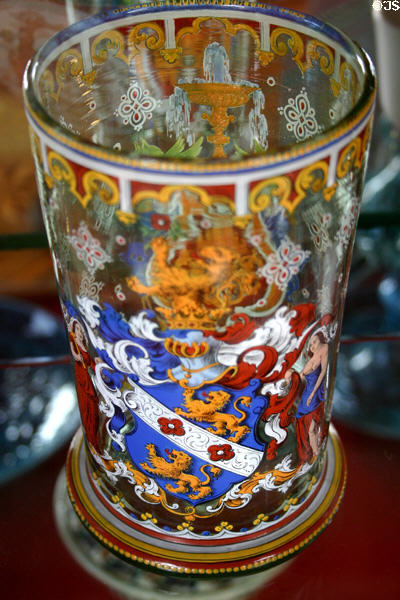 Drinking glass with enameled coat of arm at Ariana Museum. Geneva, Switzerland.