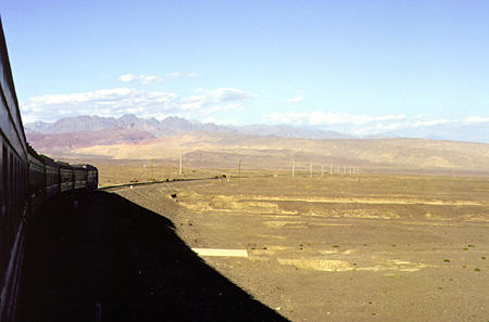 Aboard train from Turpan to Dunhuang. China.
