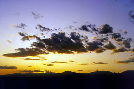 View of sunset from train between Turpan and Dunhuang. China.