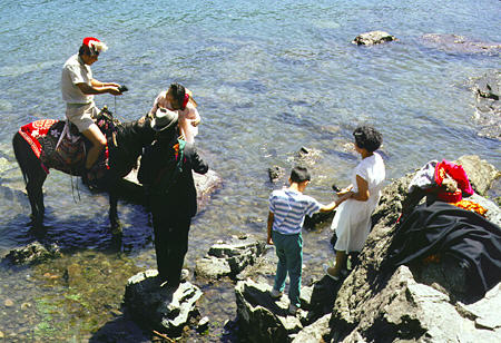 Photo session on shore of Heavenly Lake. China.