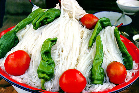 Noodles with vegetables from the Sunday market, Kashgar. China.