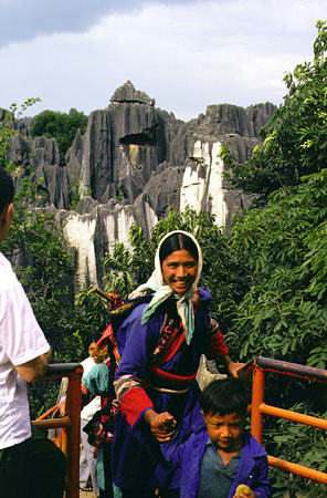 Sani people of the Yi tribe in the stone forest near Kunming. China.