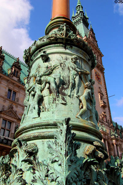 Base of flagpole with sailing ship on top at Hamburg City Hall plaza. Hamburg, Germany.