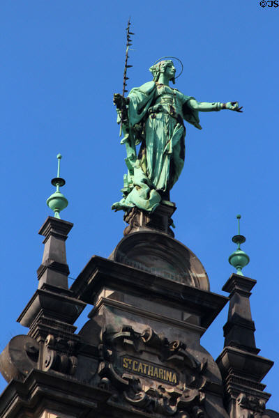 St Catharina statue atop small tower on Hamburg City Hall. Hamburg, Germany.