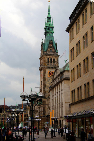 Busy pedestrian promenade in front of Hamburg City Hall. Hamburg, Germany.