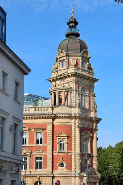 Tower topped by golden Mercury of Old Post Office. Hamburg, Germany.