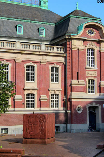 Homage to Brahms cube sculpture (1981) showing Brahms at a different age on each side by Thomas Darboven outside Laeiszhalle on Johannes-Brahms-Platz. Hamburg, Germany.