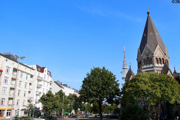 Tower of Russian Orthodox Church of St John of Kronstadt near Planten un Blomen park with communication tower in distance. Hamburg, Germany.
