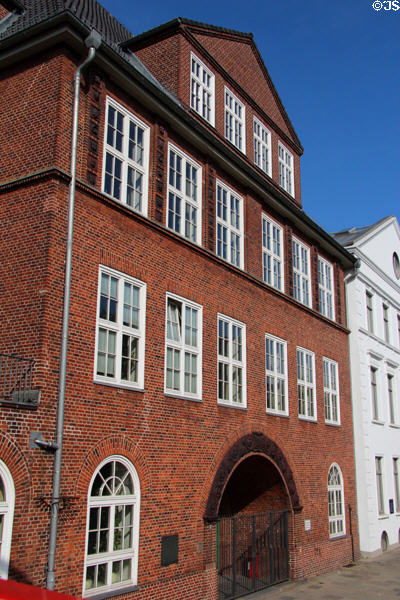 Heritage brick warehouse building (1915) in old canal district. Hamburg, Germany.