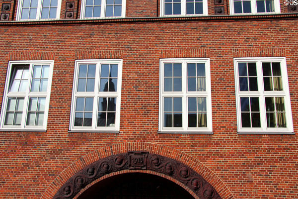 Detail of heritage brick warehouse building (1915) in old canal district. Hamburg, Germany.