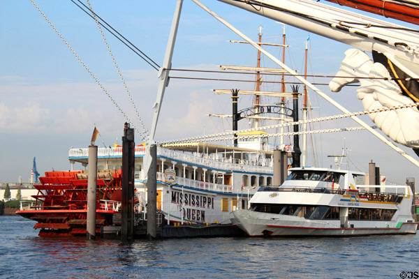 Tour boats, Mississippi Queen & Kapitän Prüsse, on Elbe River. Hamburg, Germany.