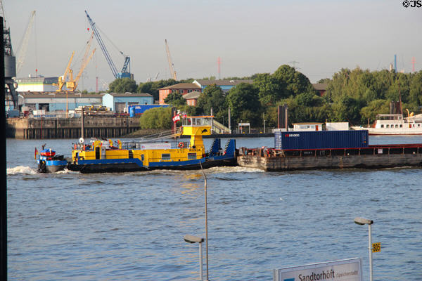Ronja inland pusher/tug boat pushing barge on Elbe River. Hamburg, Germany.