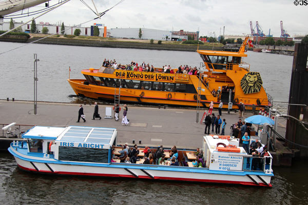 Day tour boats Altenwerder ferry & Iris Abicht tour boat on Elbe River. Hamburg, Germany.