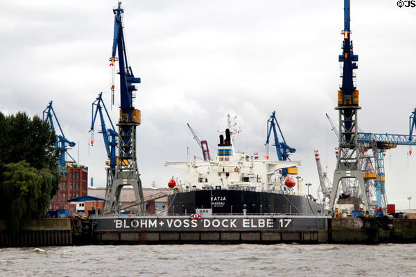 Ship in drydock at Elbe River shipyard. Hamburg, Germany.