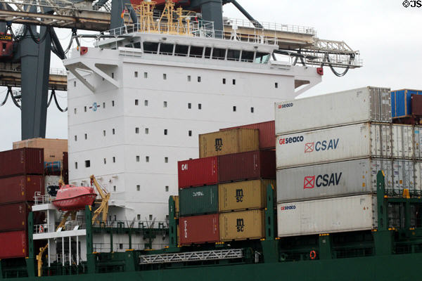 Ship's bridge and containers at container port. Hamburg, Germany.
