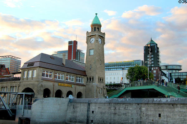 Sunset over clock tower at St Pauli Pier. Hamburg, Germany.