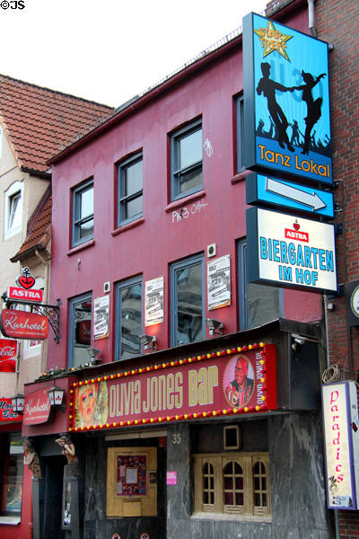 Advertising signs for Reeperbahn establishment. Hamburg, Germany.