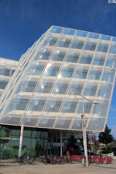 Entrance to Unilever Haus with staff bicycles in front in HafenCity. Hamburg, Germany.