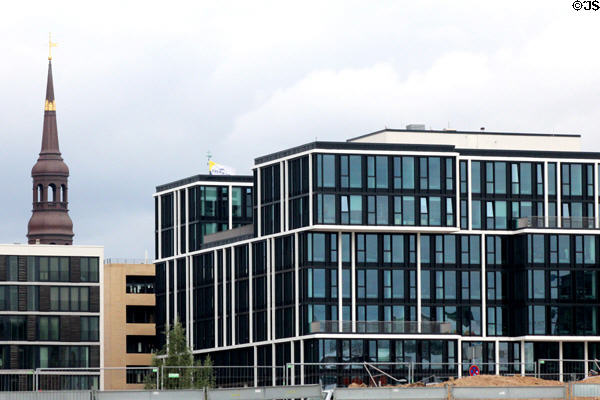 Three level black glass building (Am Kaiserkai 1 & Grosser Grasbrook 12) in HafenCity. Hamburg, Germany.