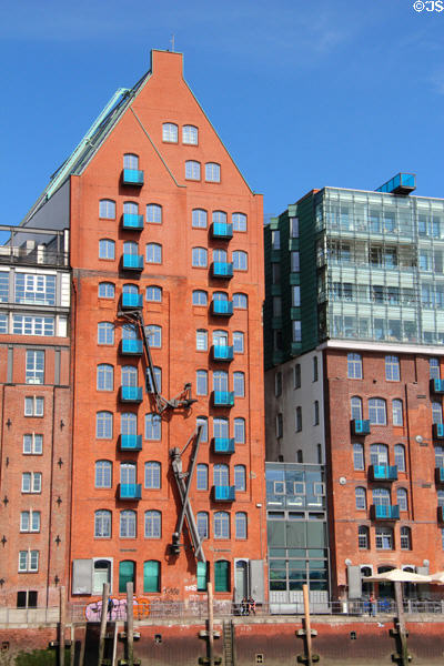 Modern building in Hanseatic brick style on shoreline of Elbe River in Altona borough. Hamburg, Germany.