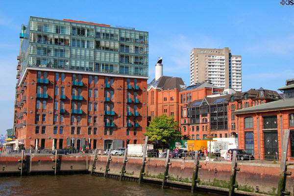 Modern buildings with Hanseatic brick style elements on shoreline of Elbe River in Altona borough. Hamburg, Germany.