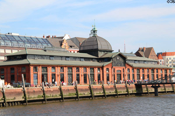 Hamburg Fish Market (existing since 1703) (St. Pauli Fischmarkt 2) overlooks the harbor and is open early Sunday mornings. Hamburg, Germany.