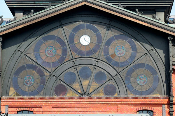 Array of stained glass windows over entrance of Hamburg Fish Market. Hamburg, Germany.