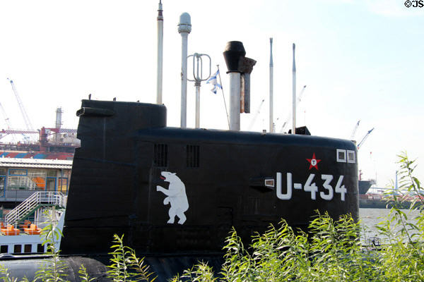 Russian submarine U-434, now a museum in Hamburg harbor with bear emblem on sail supporting periscopes, snorkel & other sensors. Hamburg, Germany.