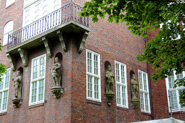 Statues on brick facade of Hamburg History Museum. Hamburg, Germany.