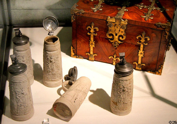 Siegburg Schnellen tankards with coat-of-arms of England Traders (c1595) & document casket of England Traders (end of 16thC) likely Antwerp origin at Hamburg History Museum. Hamburg, Germany.