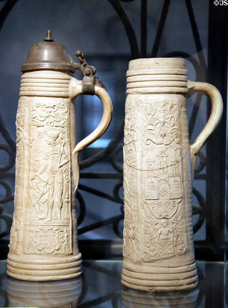 Siegburg Schnellen tankards (c1595) with coat-of-arms of England Traders guild based in Hamburg by workshop of Hans Hilger at Hamburg History Museum. Hamburg, Germany.