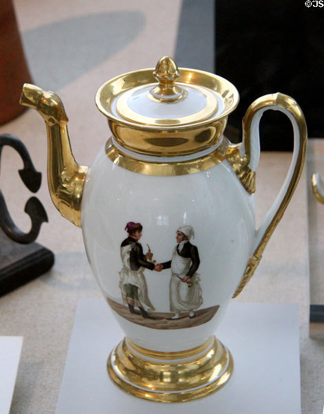Porcelain teapot with painting of confectioner in typical work clothes (c1820) at Hamburg History Museum. Hamburg, Germany.