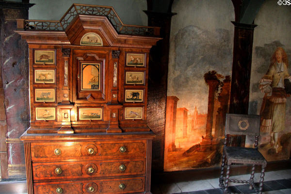 Cabinet, mounted on chest of drawers, with gemstone inlay (pietra dura) of animals (c1700) from Hamburg home of merchant Peter Rölcke at Hamburg History Museum. Hamburg, Germany.