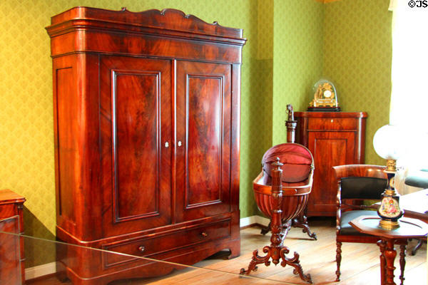 Typical sitting room (c1870) in Hamburg with walnut furniture in a mixture of styles at Hamburg History Museum. Hamburg, Germany.