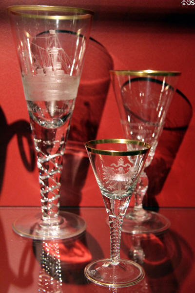 Gold rimmed wine glasses engraved with navel motif at International Maritime Museum. Hamburg, Germany.