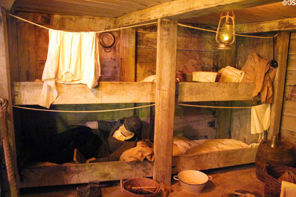 Rough communal sleeping & living quarters (c1870) for below deck passengers at Emigration Museum BallinStadt. Hamburg, Germany.