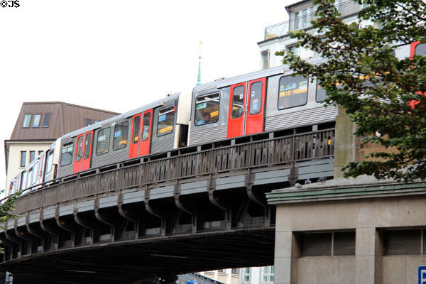 Hamburg U-Bahn rapid transit train traveling above ground. Hamburg, Germany.
