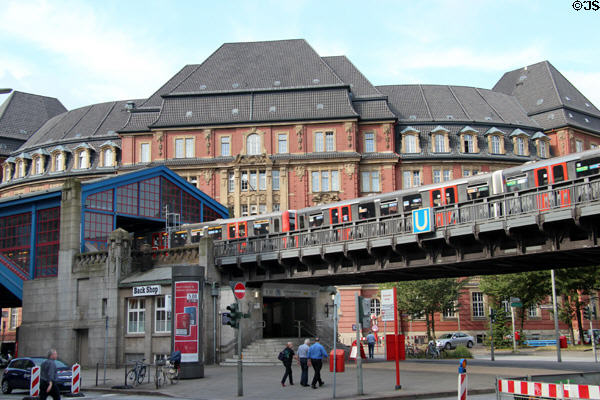 Hamburg U-Bahn rapid transit train elevated rail leaving station. Hamburg, Germany.