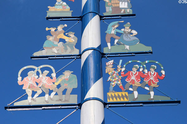 Scenes of Oktoberfest celebrations on May pole at Viktualienmarkt. Munich, Germany.