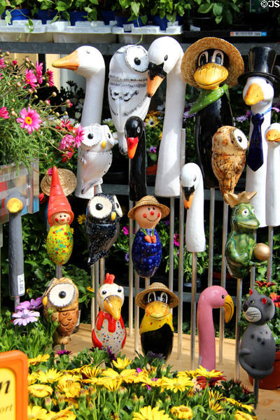 Amusing garden figures for sale at Viktualienmarkt. Munich, Germany.